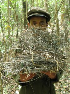Patrol team member with wires snares collected in Nakai-Nam Theun National Protected Area, Lao PDR. 